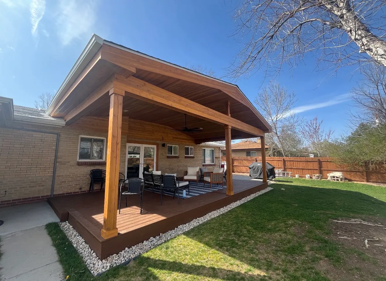Angled exterior view of cedar roof cover and composite deck in Wheat Ridge Colorado