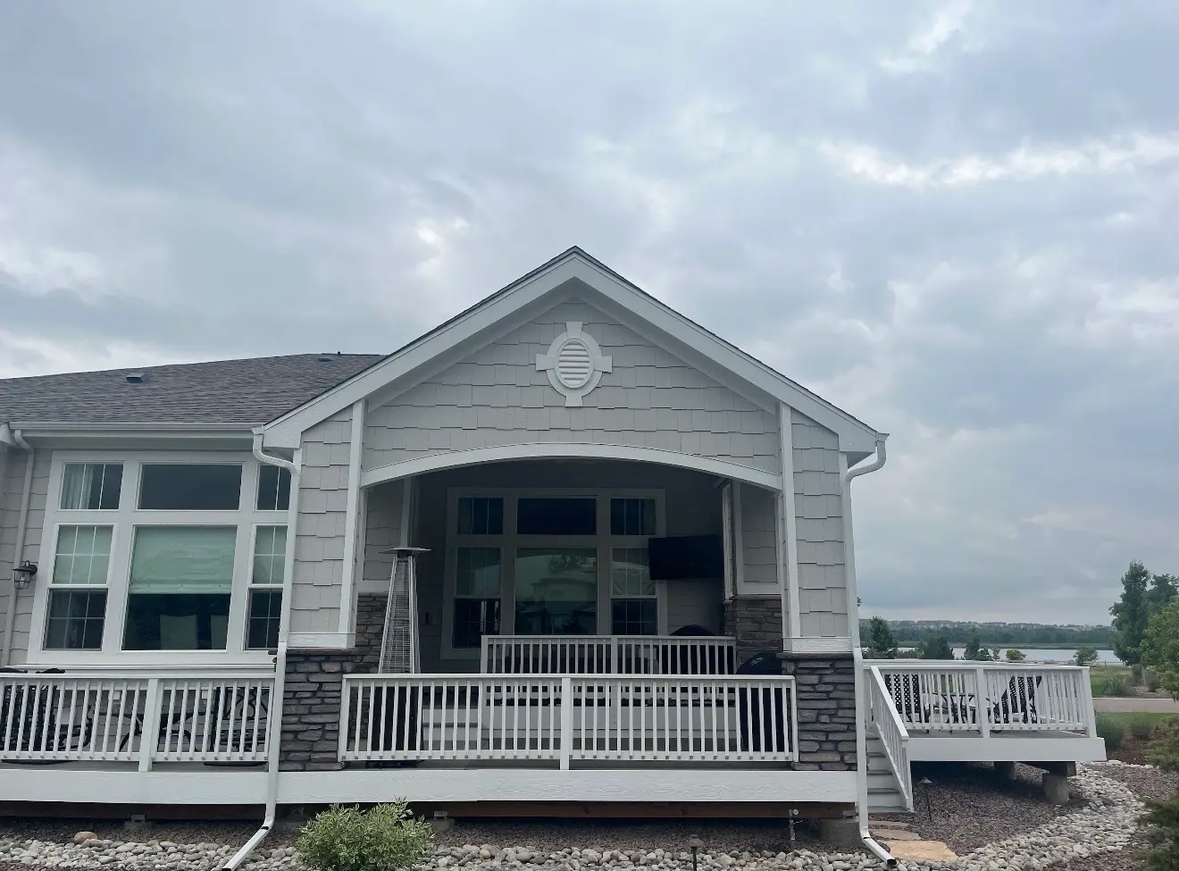 Front view of covered deck matching house design in Columbine Valley Colorado