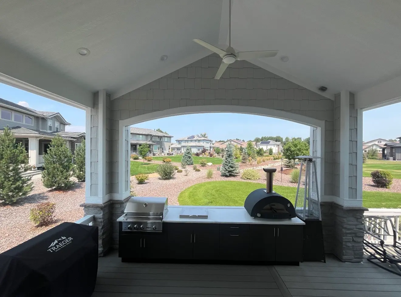 Covered outdoor kitchen area under roof cover in Columbine Valley Colorado