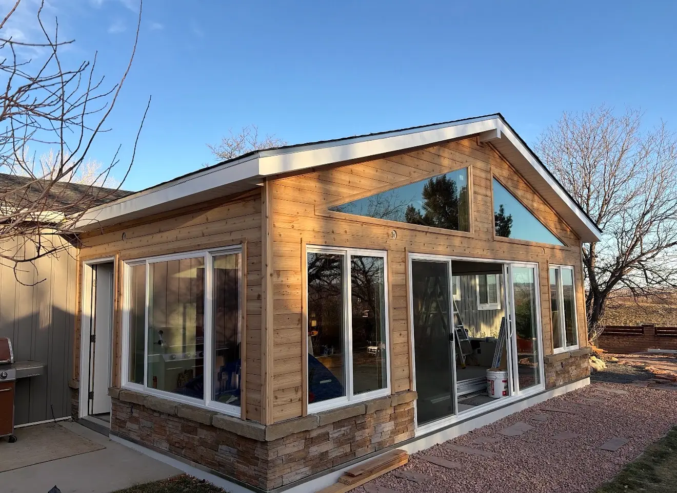 Side exterior view of completed custom sunroom in Boulder Colorado
